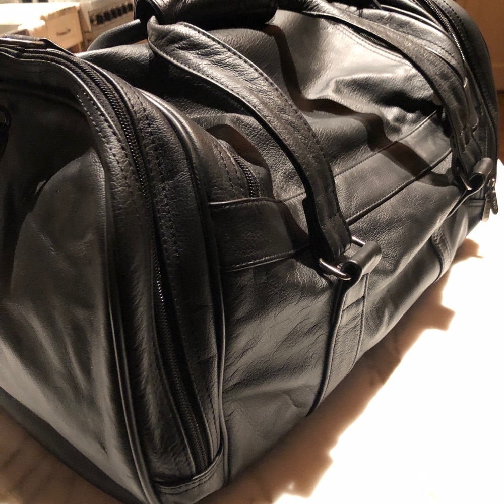 2 leather bags-  $25.00 @